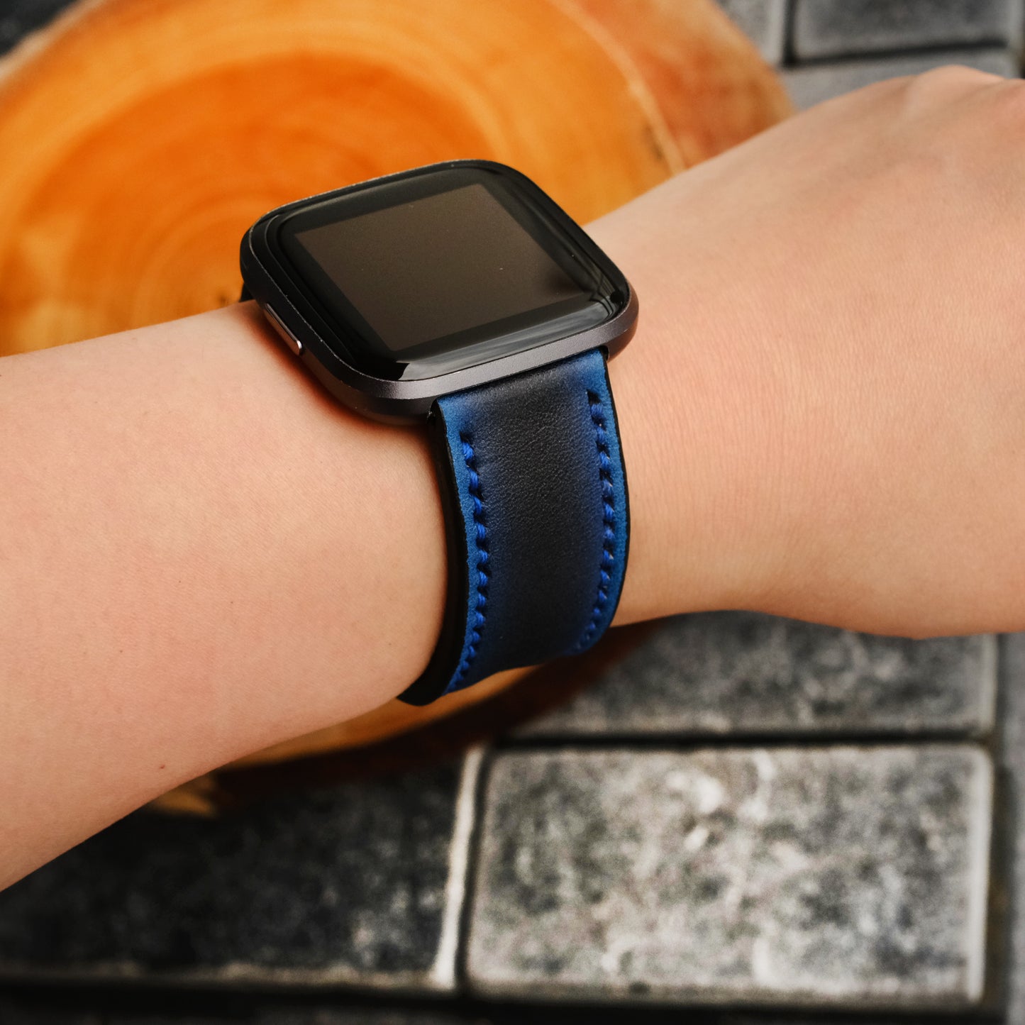 neon blue watch strap on fitbit